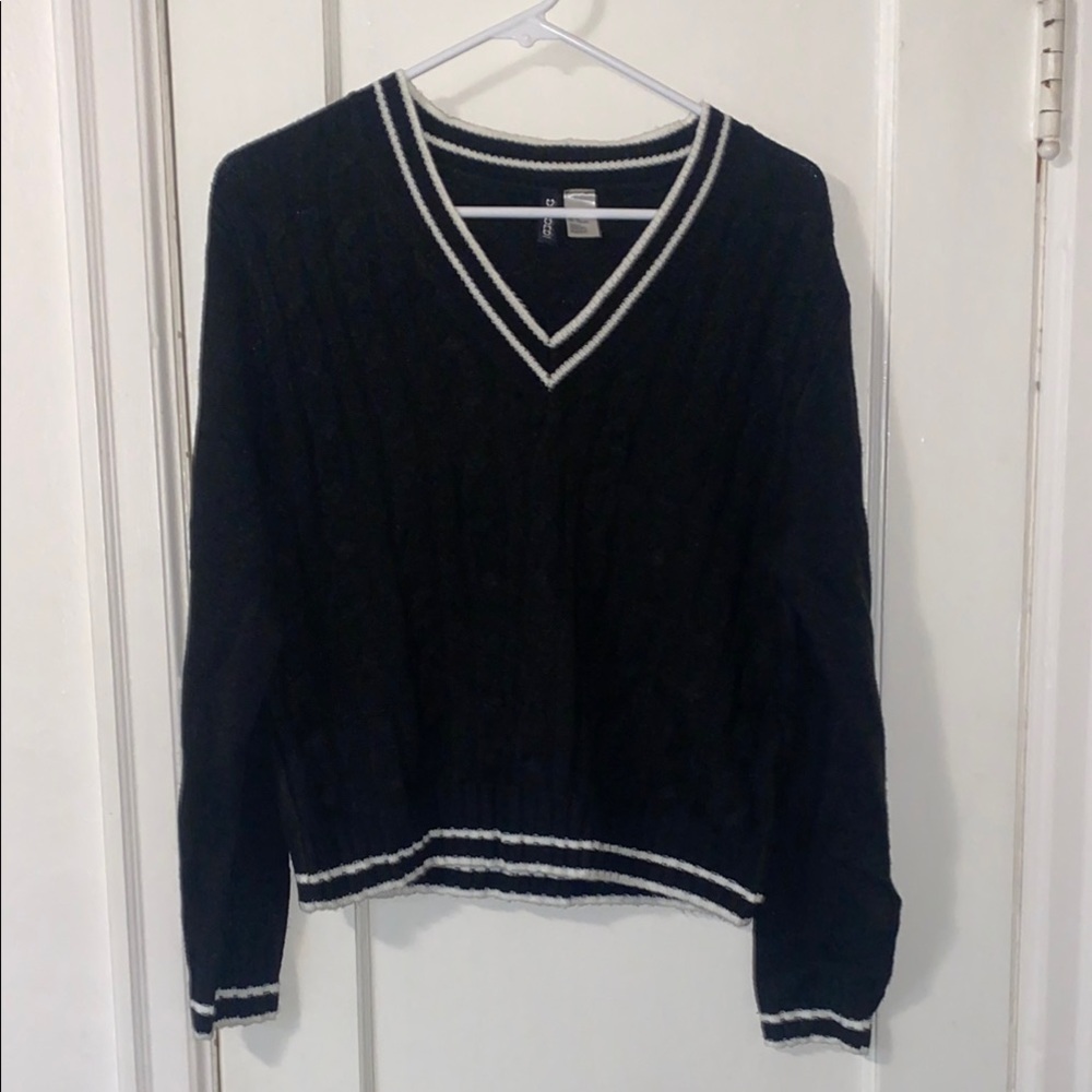 Divided Black and White V-Neck Sweater with Striped Trim